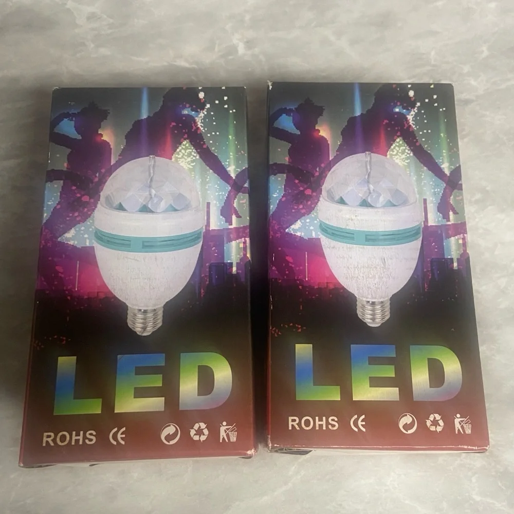 Two (2) pack RGB rotating LED light bulbs NIB